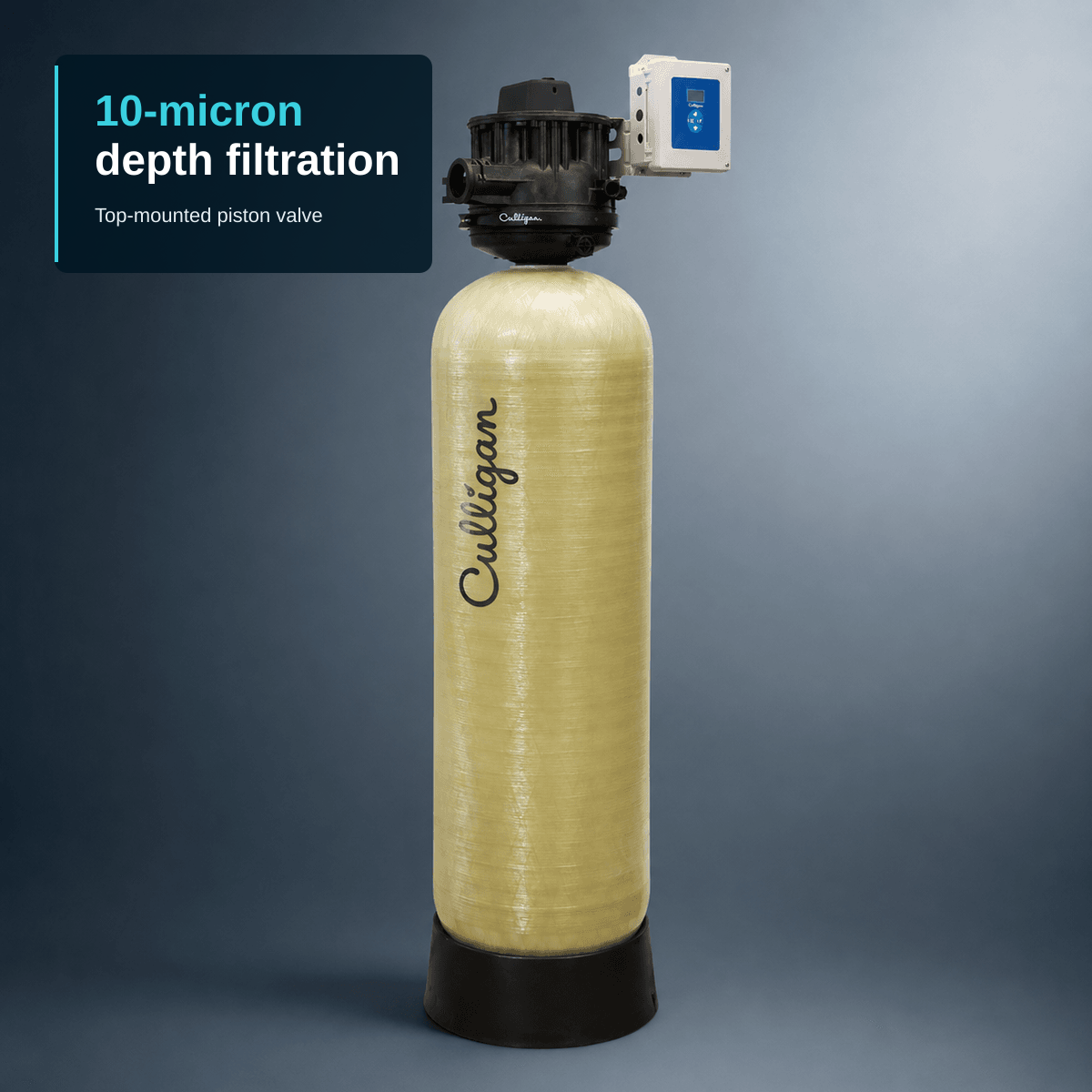 Editorial composition of a single Culligan CTM top-mount commercial filter: a tall cream/tan fibreglass-reinforced tank with a black top-mounted piston-valve control head, a white Smart Controller box mounted beside the valve, a black moulded base ring, and the vertical Culligan script wordmark on the tank body. A compact text block anchored to the top-left carries the headline "10-micron depth filtration", with "10-micron" picked out in cyan, and the subtitle "Top-mounted piston valve".