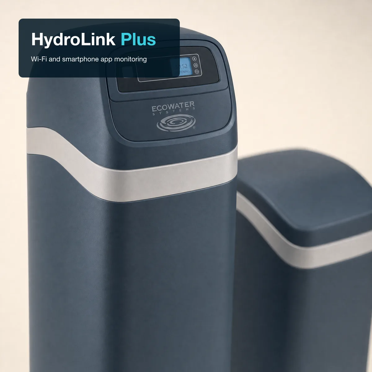 Upper section of the EcoWater ECR3702 mineral tank showing the dark polymer digital control head with subtle EcoWater branding, brine tank visible softly in background.